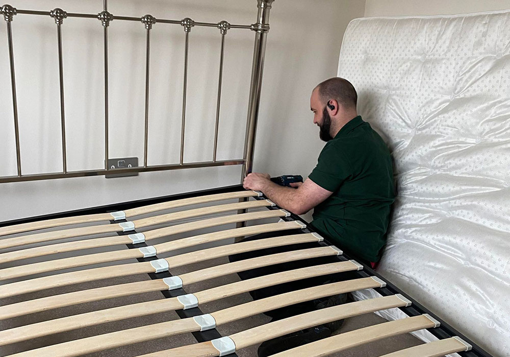 Taking a bed apart on moving day